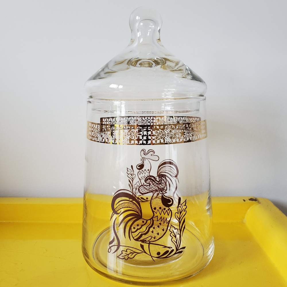 Vintage lidded clear glass jar with golden rooster design